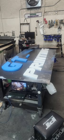Dimensional GT Printing letters being fabricated on the work table at Wicked Signs & Fabrication
